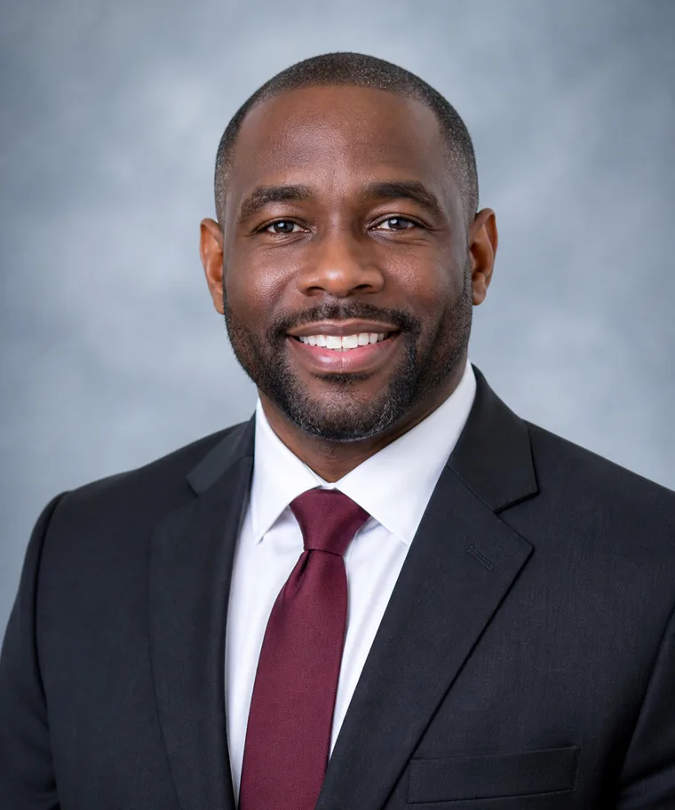 Portrait of a smiling church leader in a suit and tie
